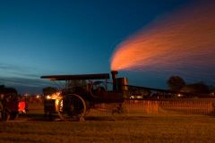 Steam thrasher at dusk