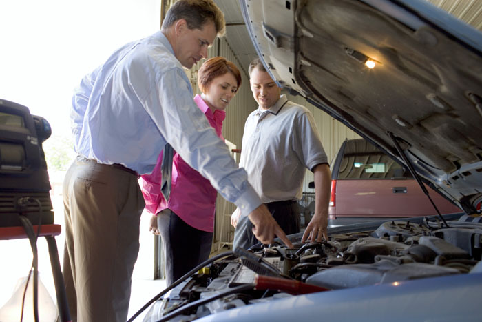 More information about "Temporary Helpers  - - -  Some people are rather creative as to how they riggle their way to be next to their car in the repair shop."